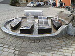 Brunnenanlage aus Basalt / Granit